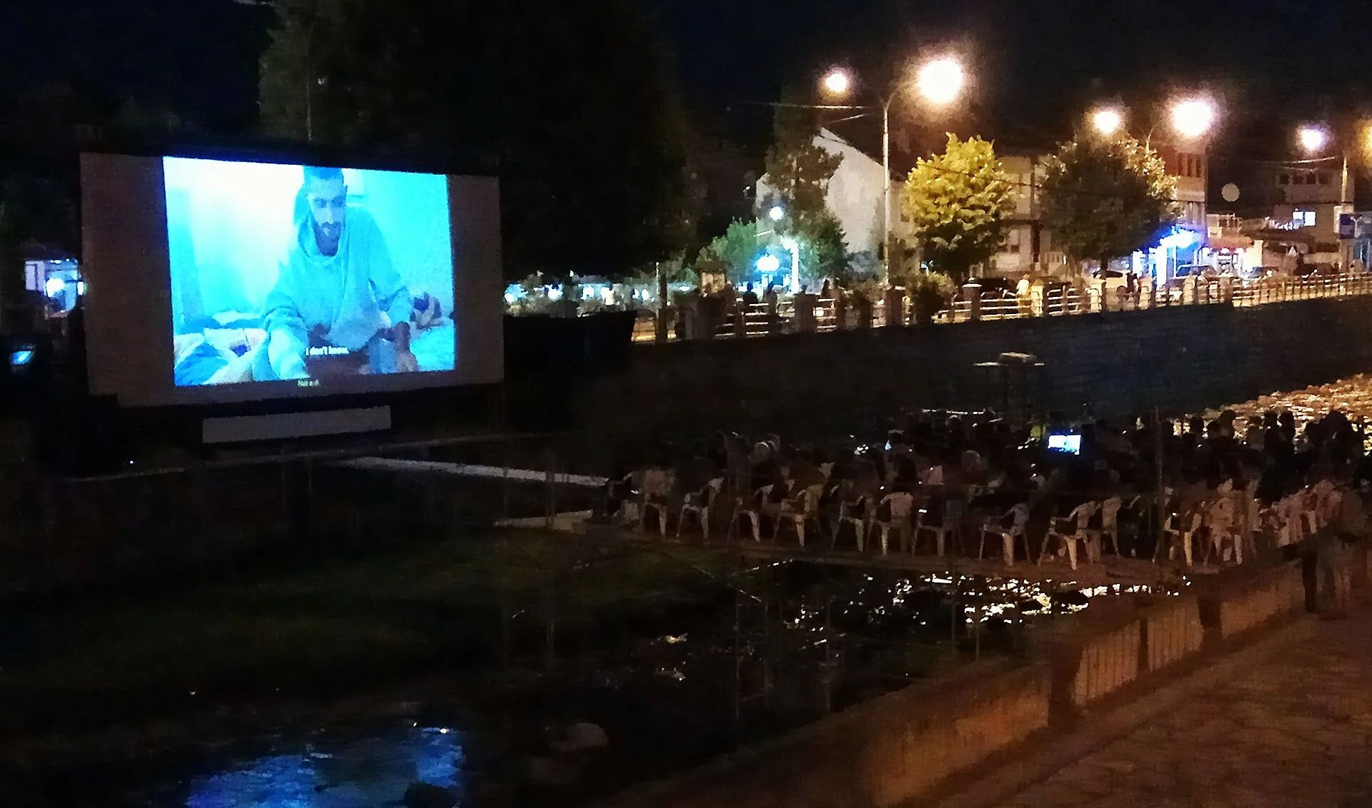 An improvised cinema platform over the river in Prizren during DokuFest 2017